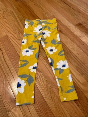 Carter's bright yellow leggings with flowers
